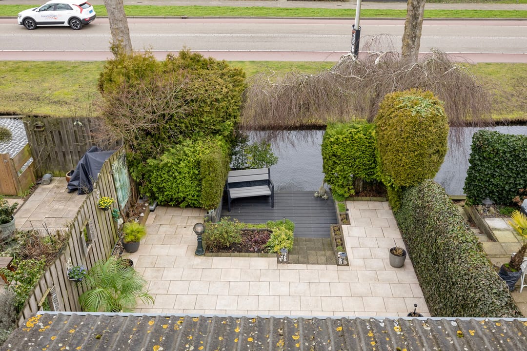 Spacious extended corner home with water garden and solar panels — 38