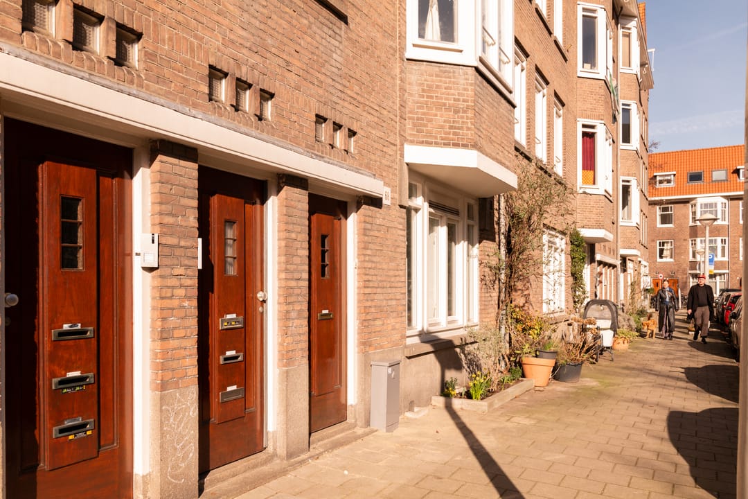 Foto 31 van Woestduinstraat 68-H