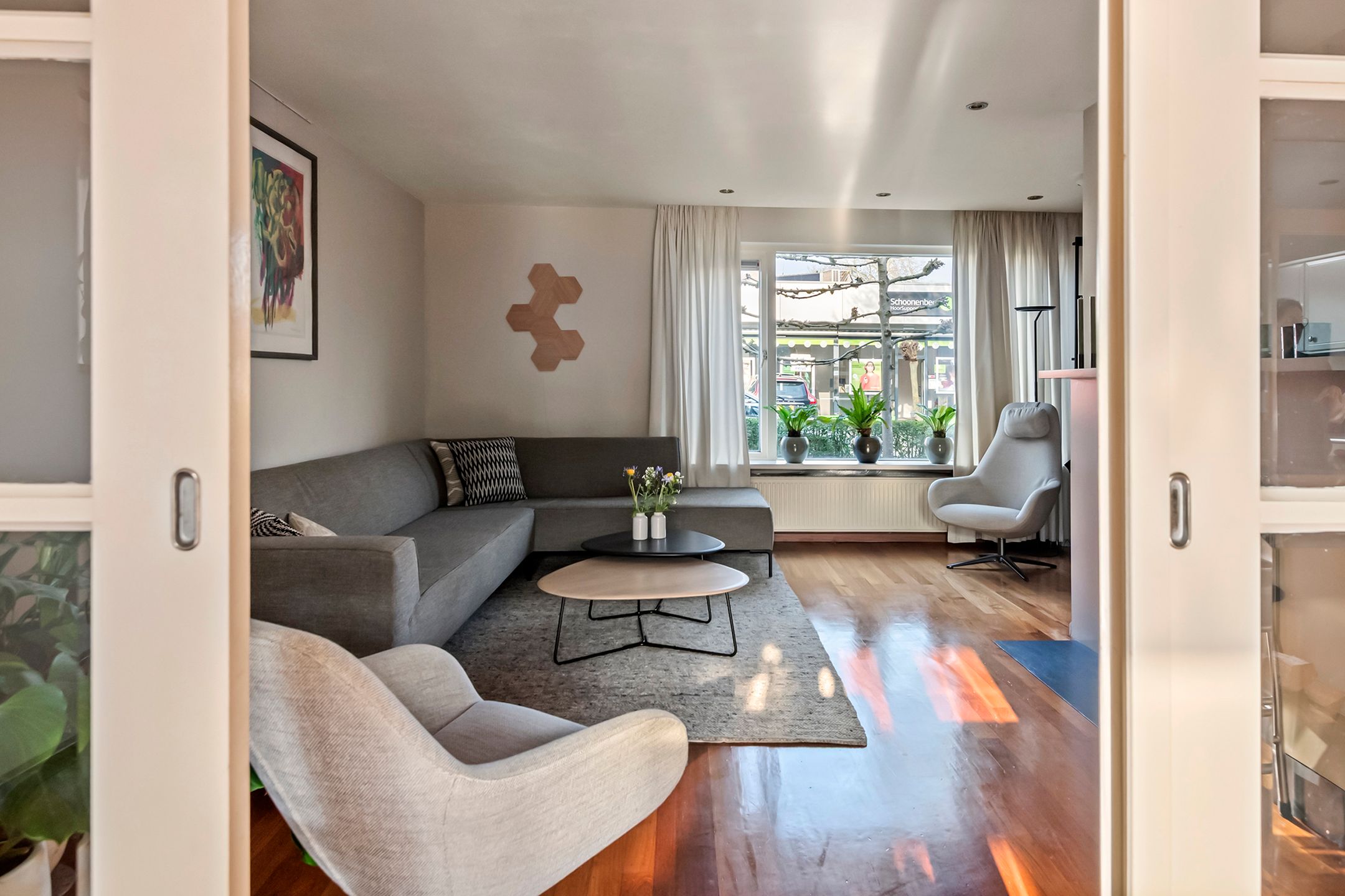 Spacious semi-detached home with character, featuring 5 bedrooms, suite-style living room, and sunny southwest garden — 13
