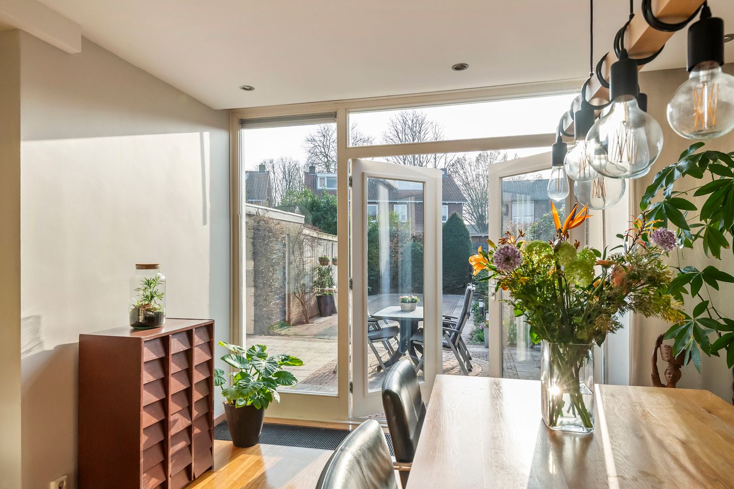 Spacious semi-detached home with character, featuring 5 bedrooms, suite-style living room, and sunny southwest garden — 17