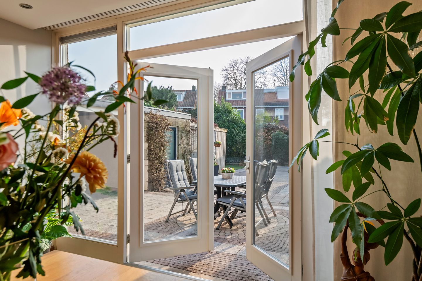 Spacious semi-detached home with character, featuring 5 bedrooms, suite-style living room, and sunny southwest garden — 18