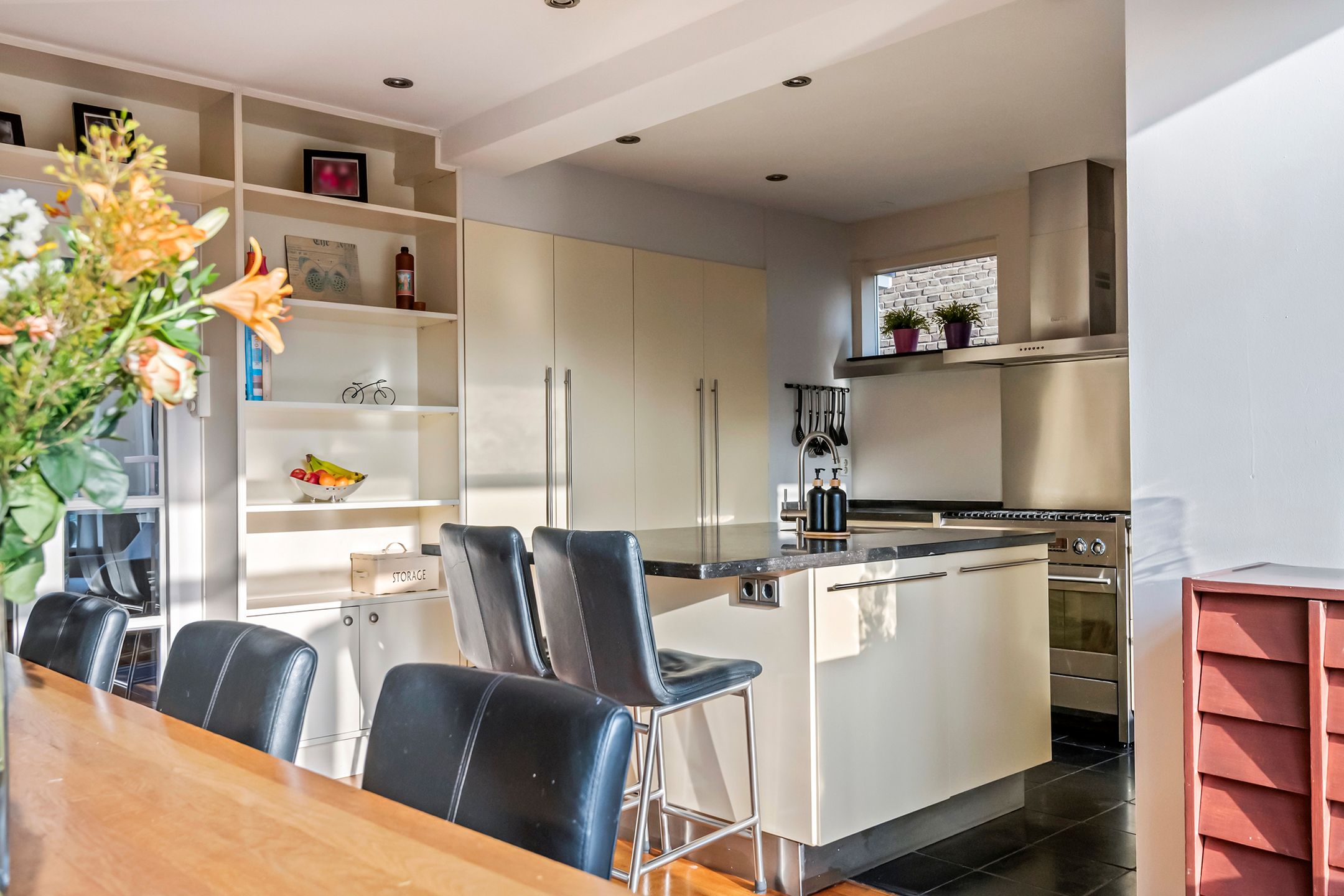 Spacious semi-detached home with character, featuring 5 bedrooms, suite-style living room, and sunny southwest garden — 25