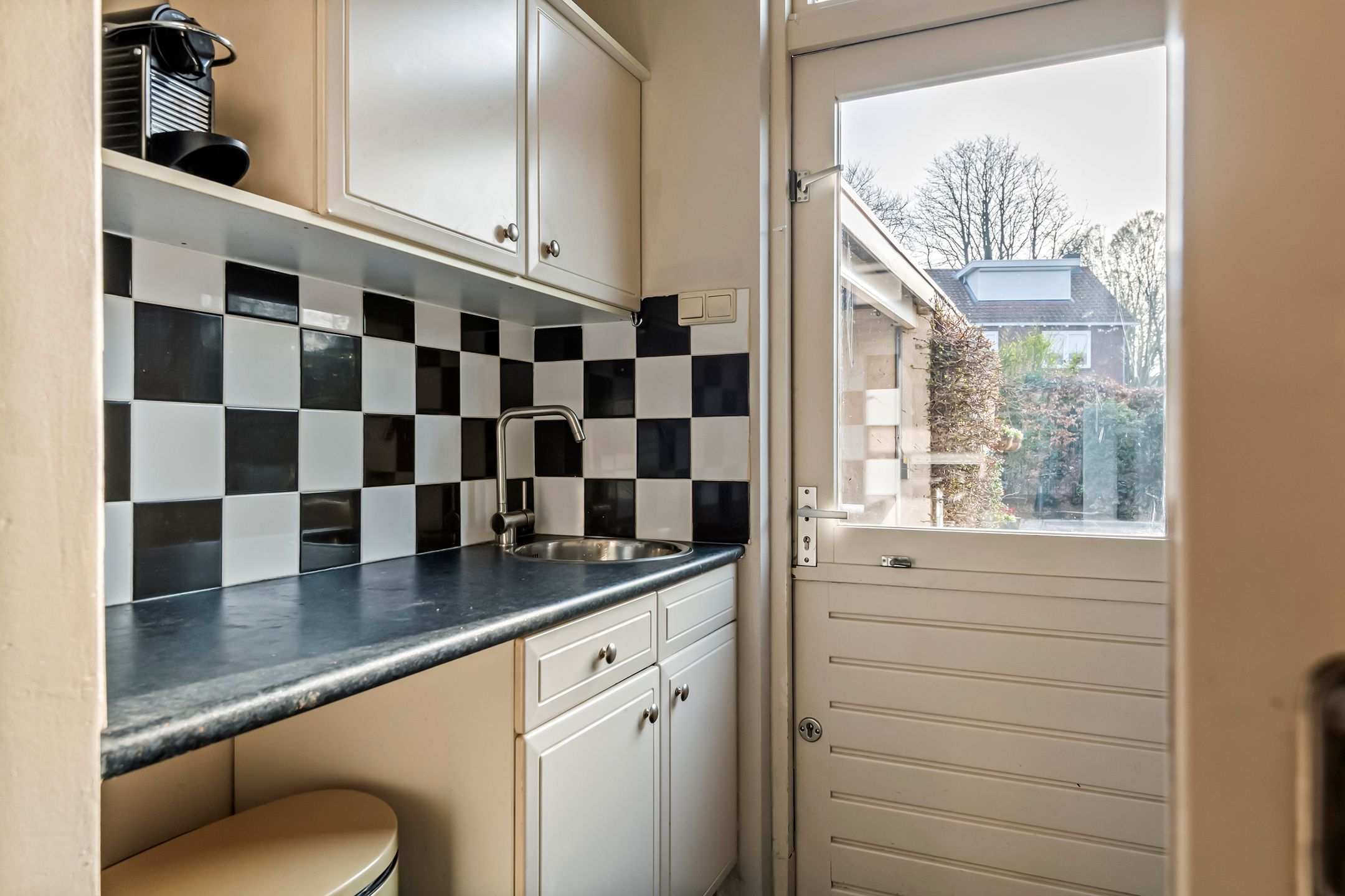 Spacious semi-detached home with character, featuring 5 bedrooms, suite-style living room, and sunny southwest garden — 27