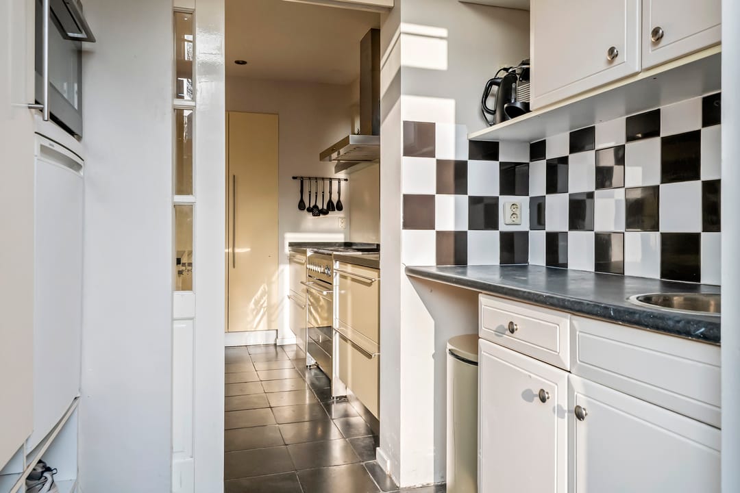 Spacious semi-detached home with character, featuring 5 bedrooms, suite-style living room, and sunny southwest garden — 28