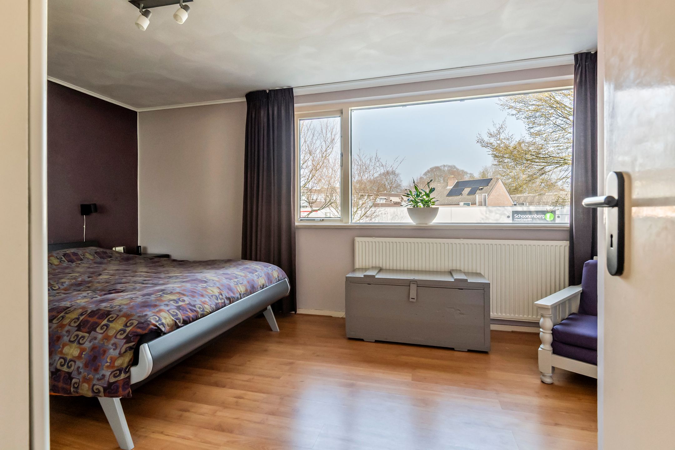 Spacious semi-detached home with character, featuring 5 bedrooms, suite-style living room, and sunny southwest garden — 30