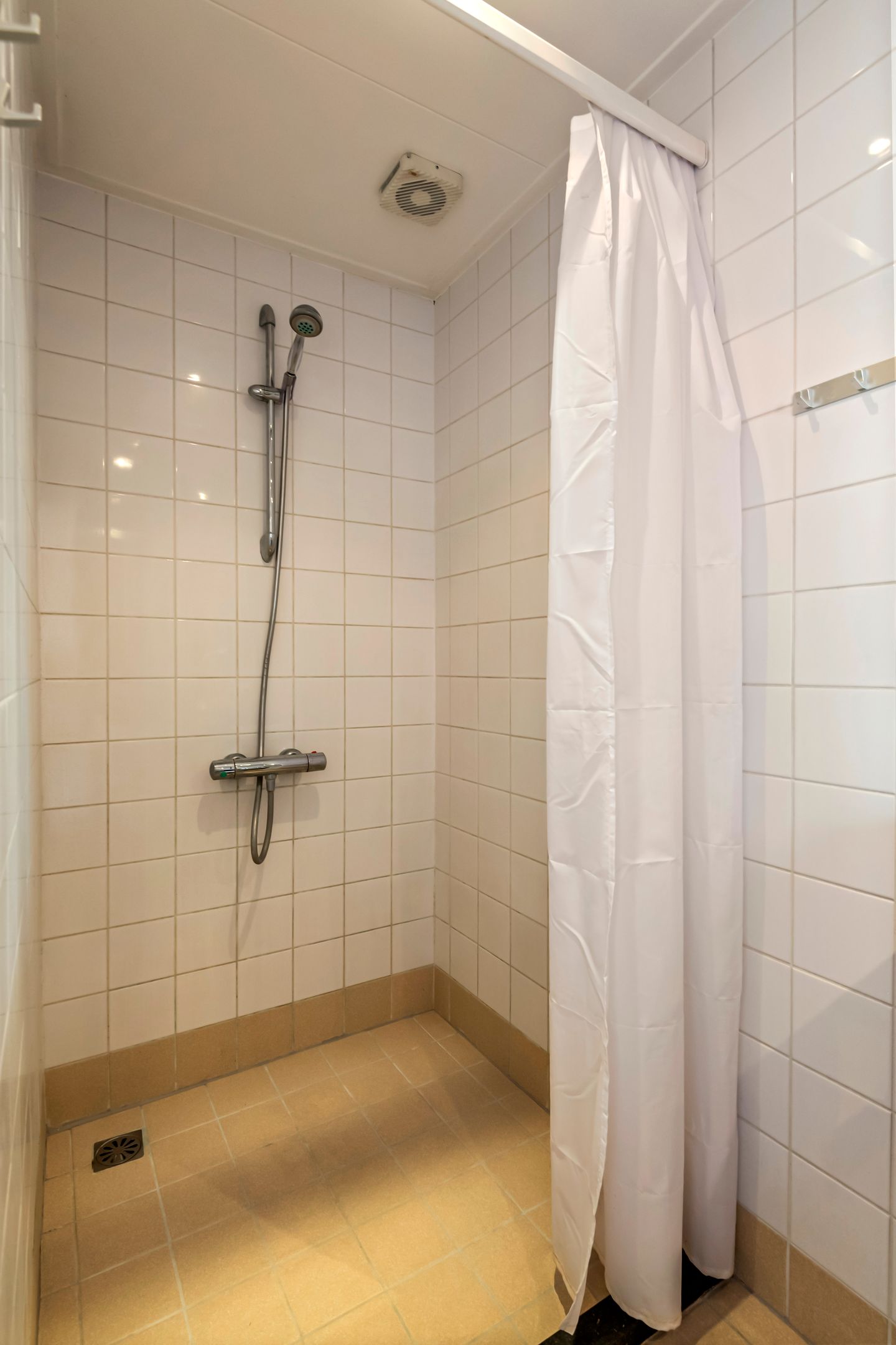 Spacious semi-detached home with character, featuring 5 bedrooms, suite-style living room, and sunny southwest garden — 32