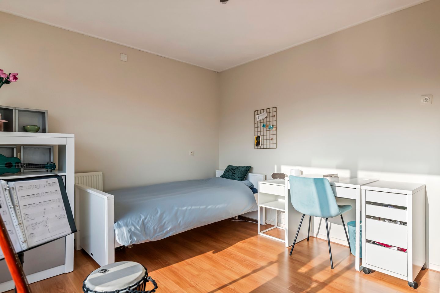 Spacious semi-detached home with character, featuring 5 bedrooms, suite-style living room, and sunny southwest garden — 37