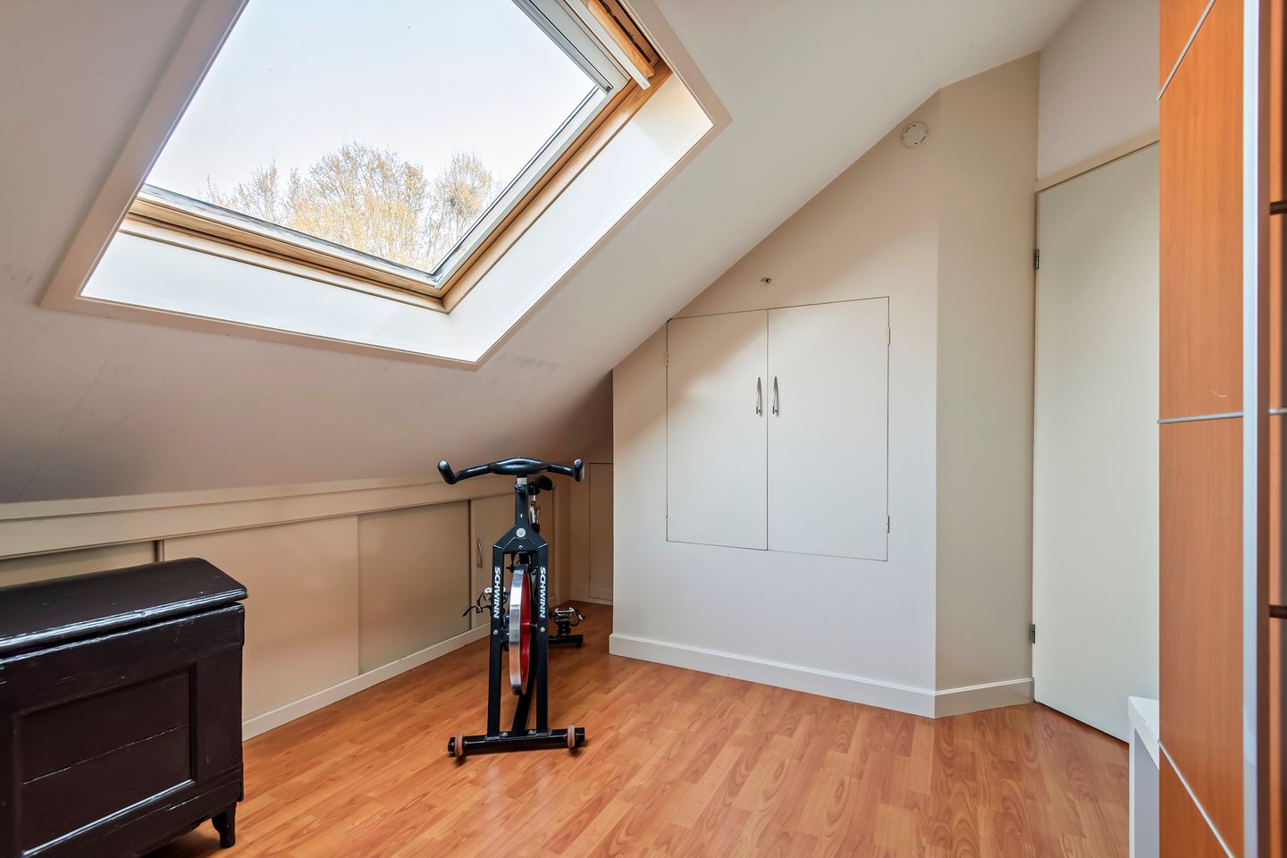 Spacious semi-detached home with character, featuring 5 bedrooms, suite-style living room, and sunny southwest garden — 46