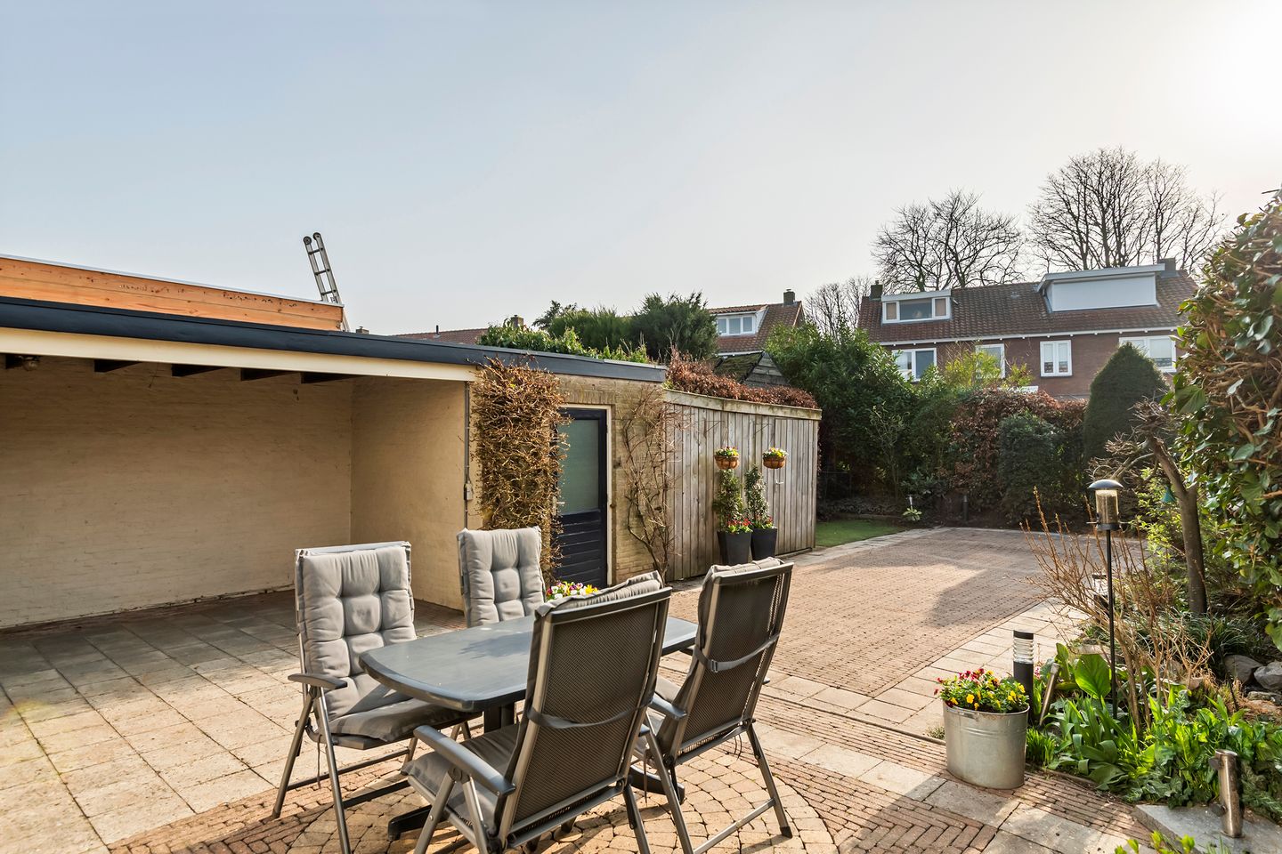 Spacious semi-detached home with character, featuring 5 bedrooms, suite-style living room, and sunny southwest garden — 47