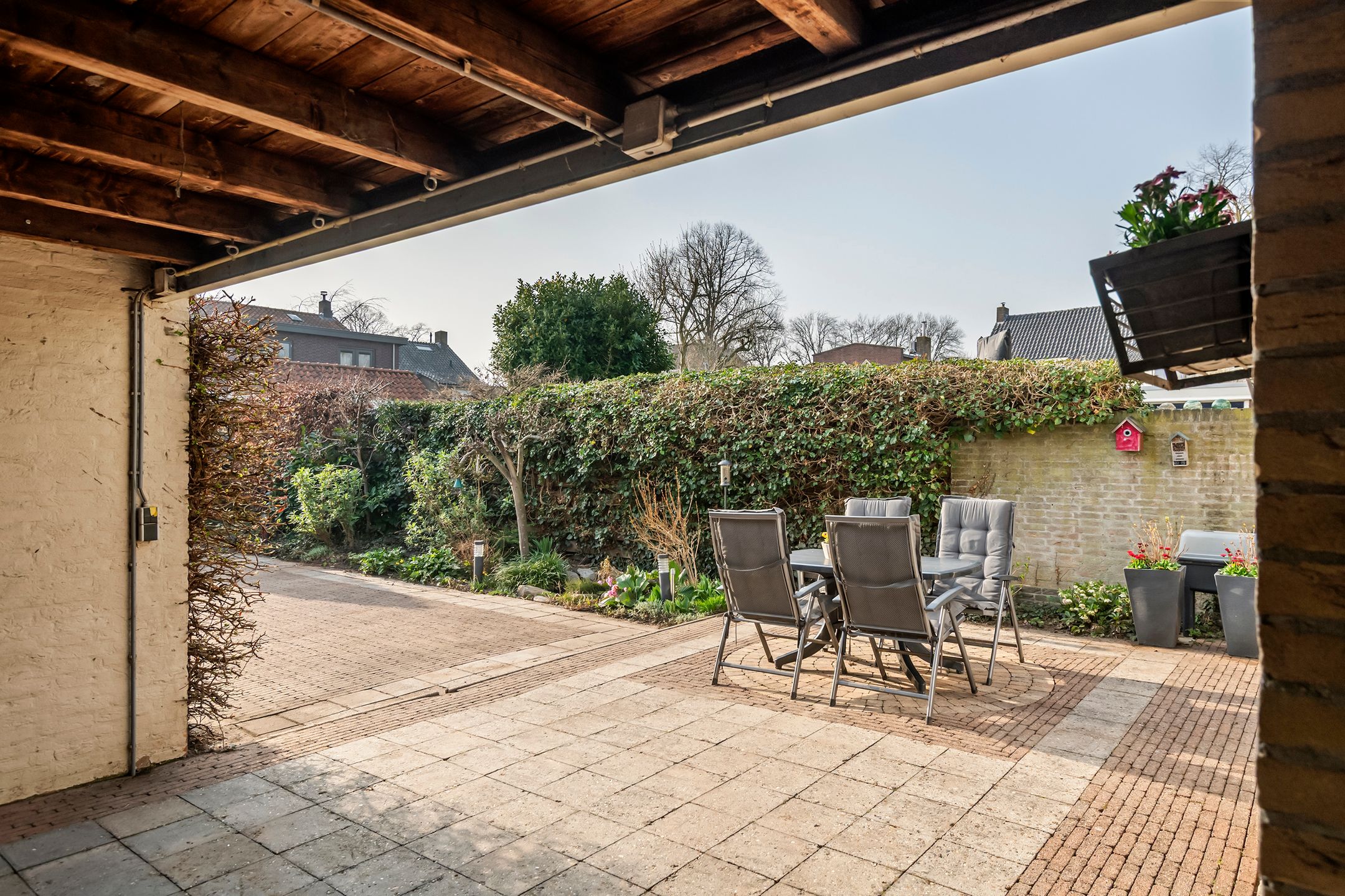 Spacious semi-detached home with character, featuring 5 bedrooms, suite-style living room, and sunny southwest garden — 48