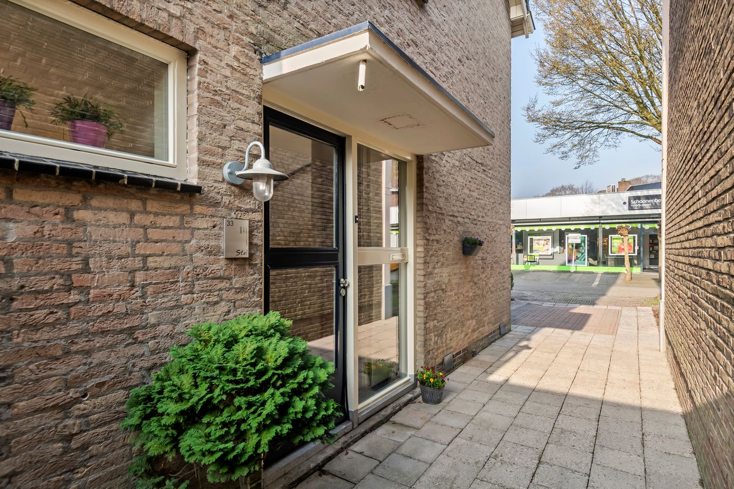 Spacious semi-detached home with character, featuring 5 bedrooms, suite-style living room, and sunny southwest garden — 52