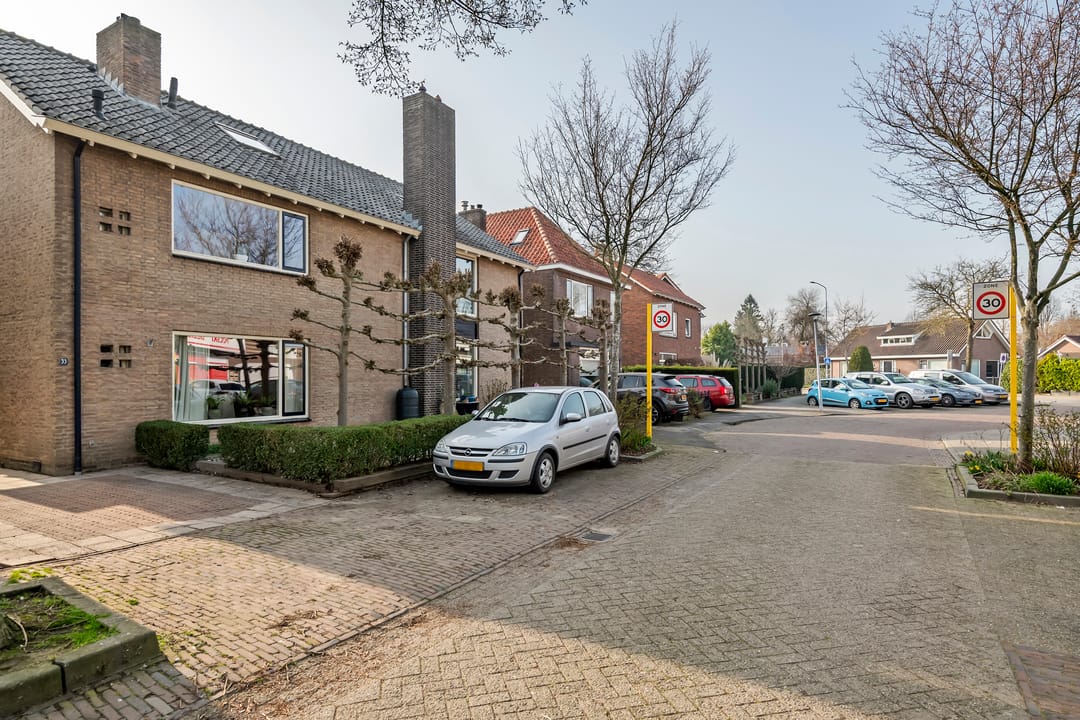 Spacious semi-detached home with character, featuring 5 bedrooms, suite-style living room, and sunny southwest garden — 53