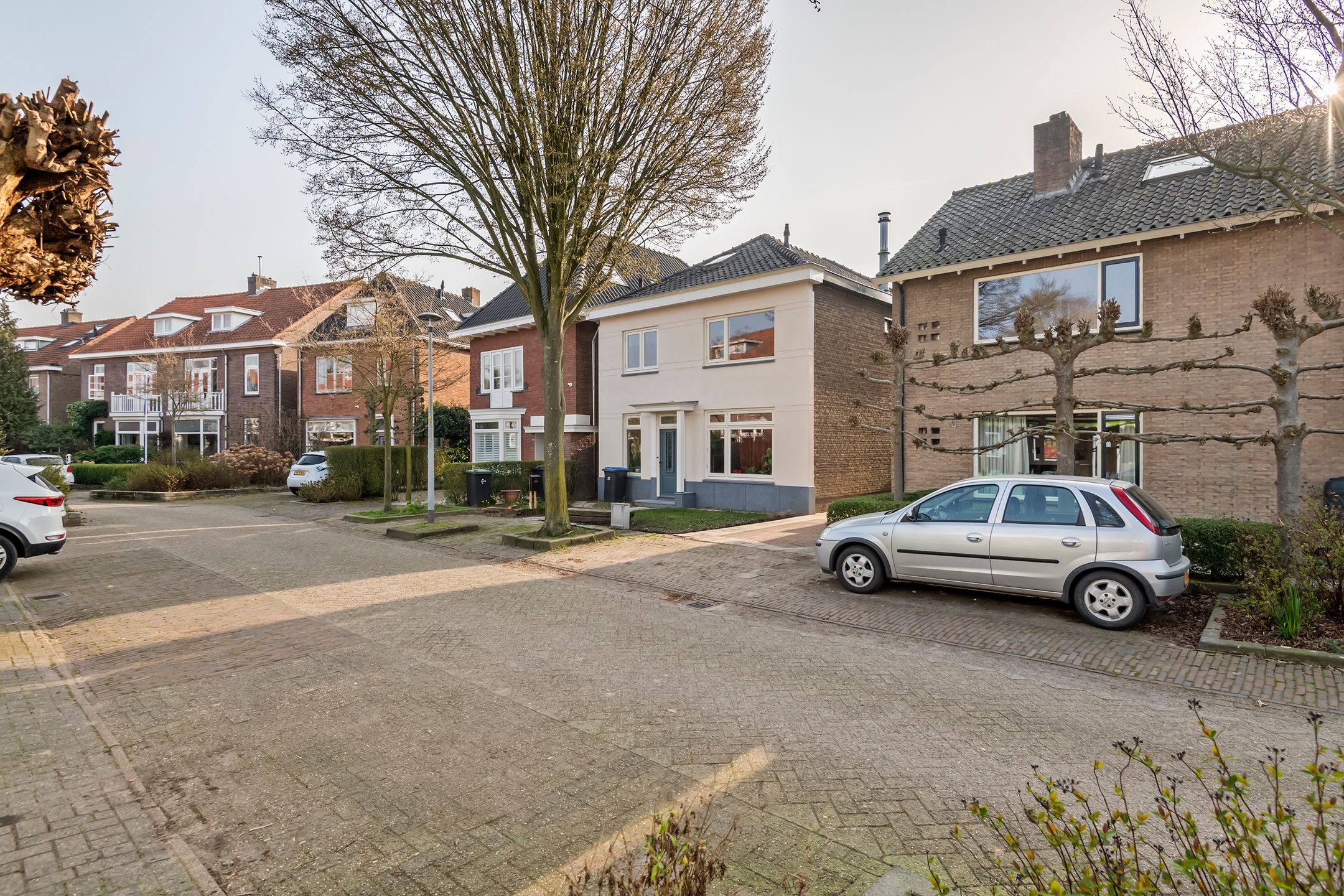 Spacious semi-detached home with character, featuring 5 bedrooms, suite-style living room, and sunny southwest garden — 54