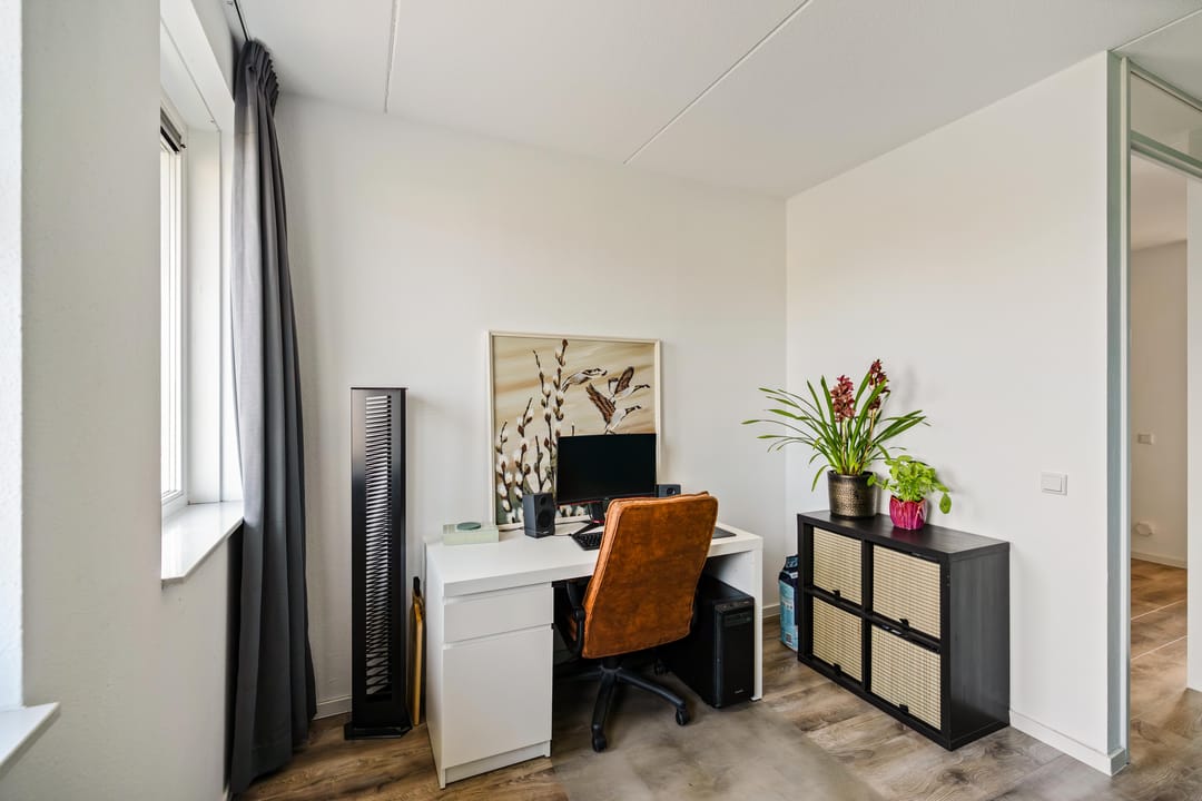 Modern corner home with four bedrooms and spacious driveway — 22