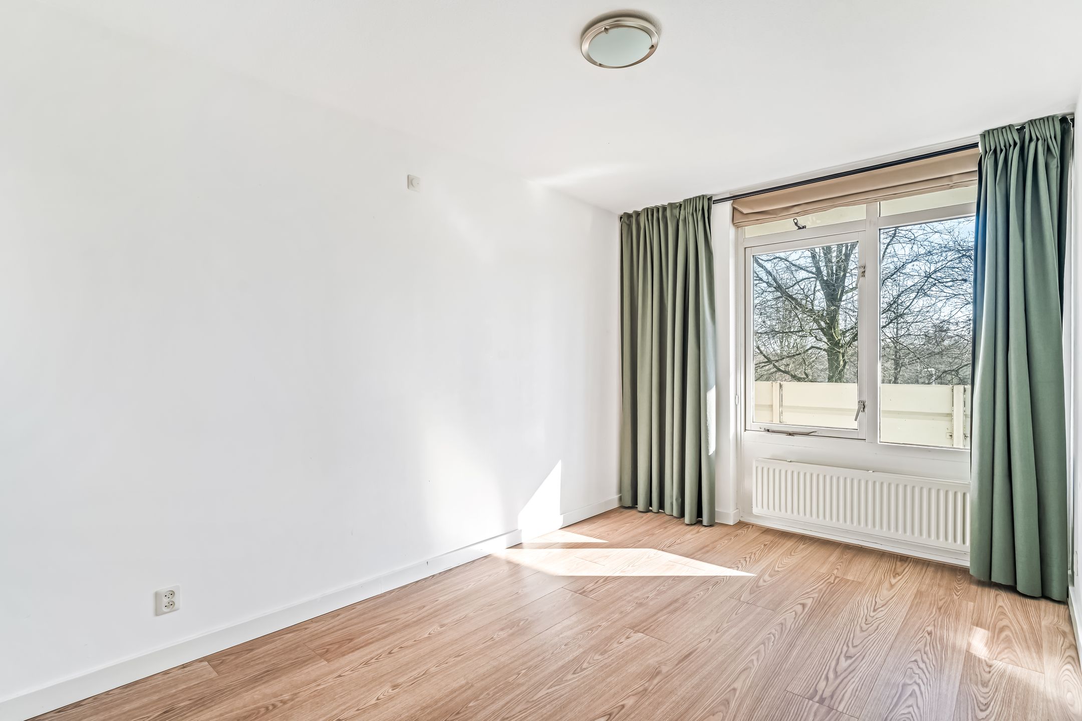 Foto 21 van Curiestraat 26