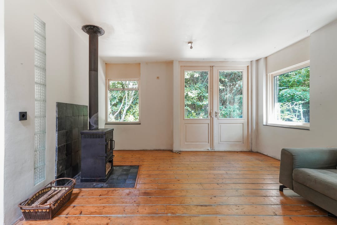 Unieke geschakelde bungalow met riant perceel aan het water in Tilburg — 24