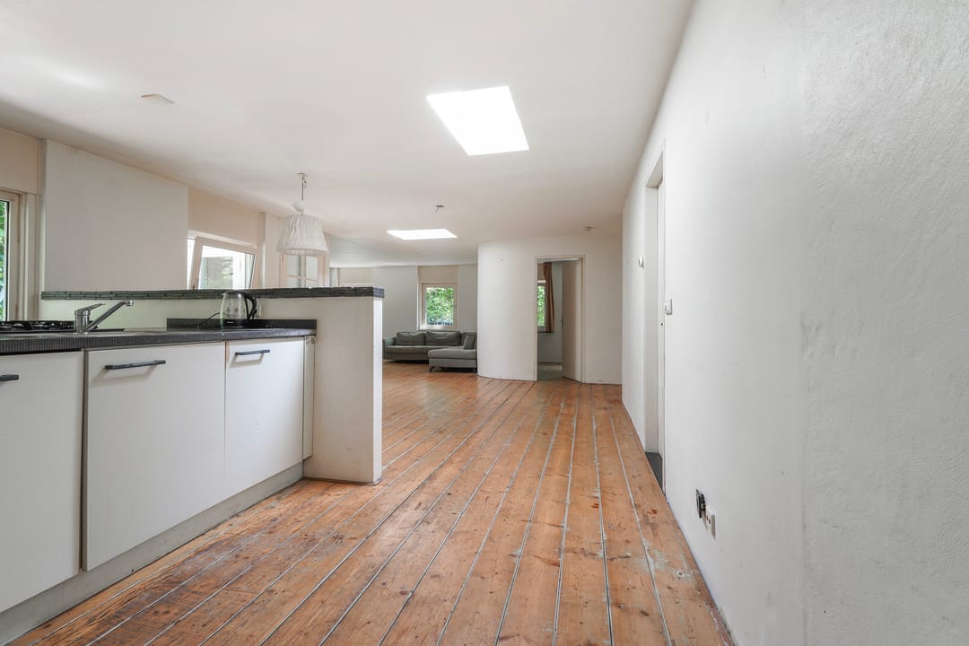 Unieke geschakelde bungalow met riant perceel aan het water in Tilburg — 32