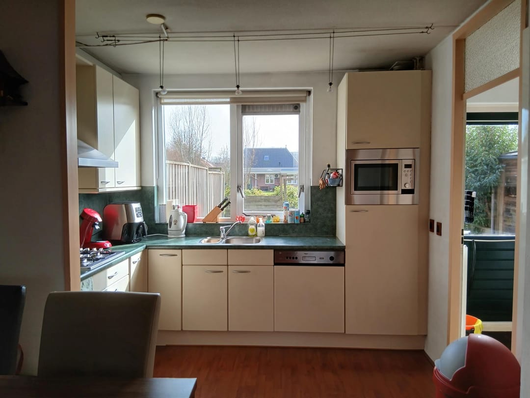 Spacious terraced house with four bedrooms and unobstructed views in Zwaag — 15