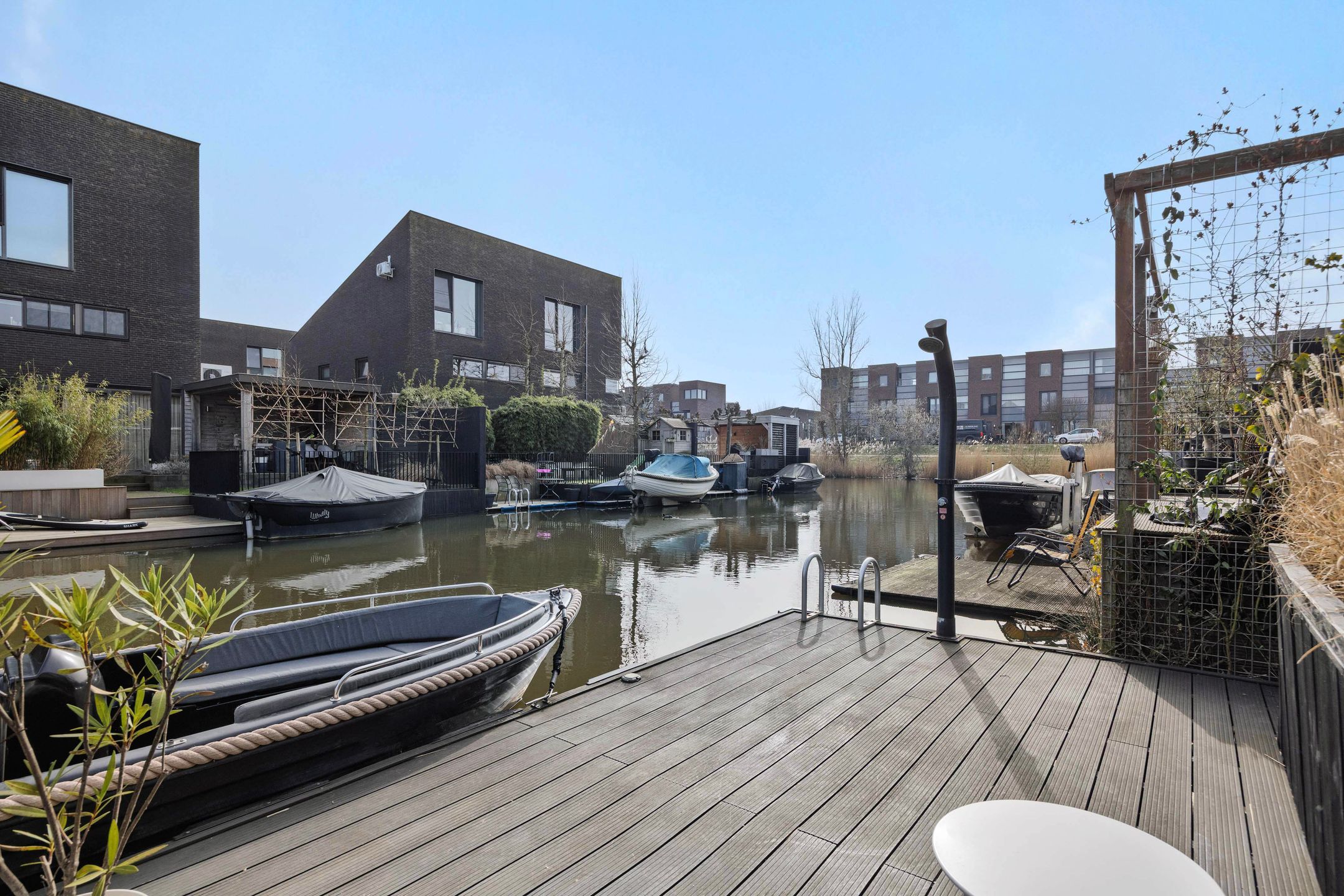 Modern Waterfront Family Home with Private Dock and Four Bedrooms — 39