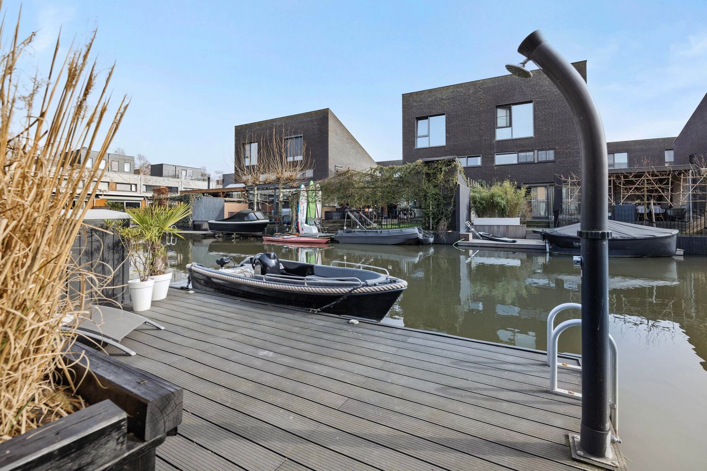 Modern Waterfront Family Home with Private Dock and Four Bedrooms — 40