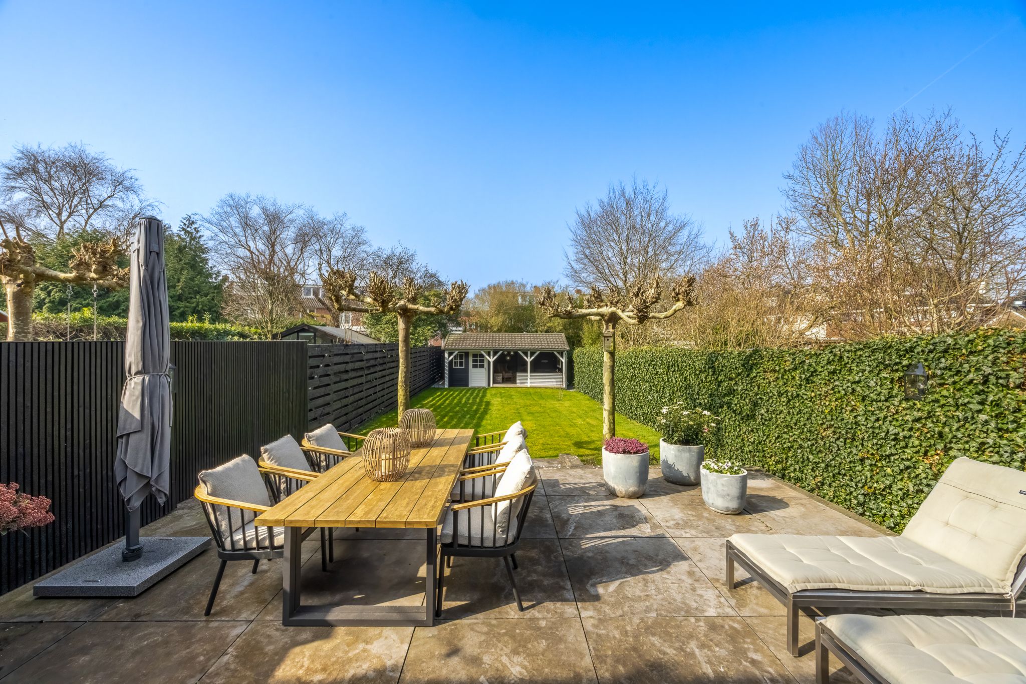 Charming semi-detached villa with deep garden and veranda in Naarden — 21