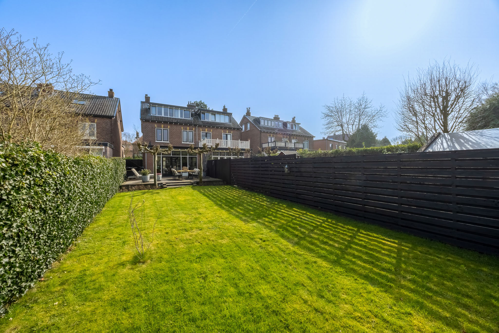 Charming semi-detached villa with deep garden and veranda in Naarden — 39
