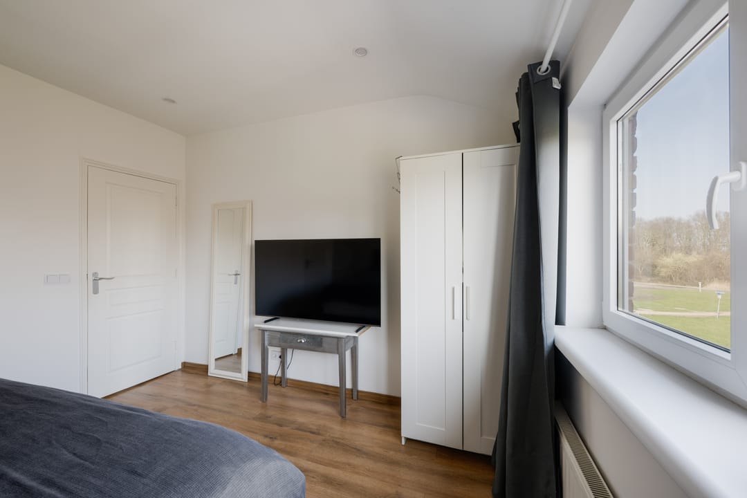 Foto 11 van Wijkeroogstraat 84