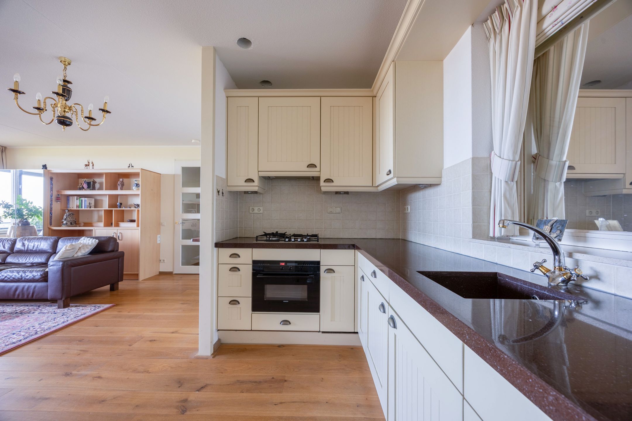 Comfortable 4th-floor apartment with balcony, parking, and scenic views in Cuijk — 12