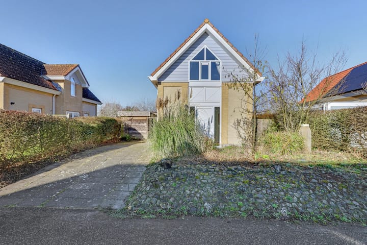 Vrijstaande woning te koop: Golfslag 9, Kamperland