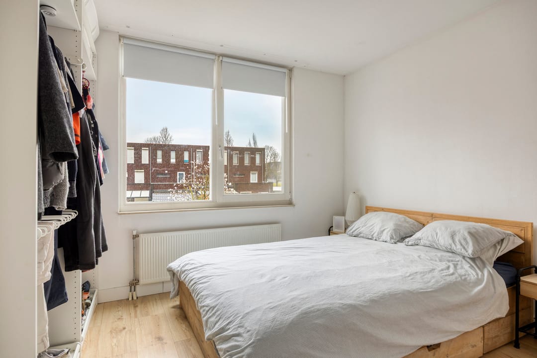 Well-maintained corner house with 3 bedrooms and large insulated storage — 19
