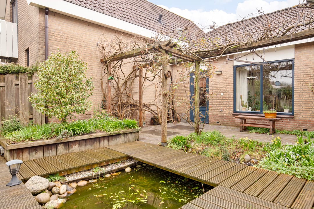 Spacious semi-detached bungalow with garage and sunny west-facing garden — 57