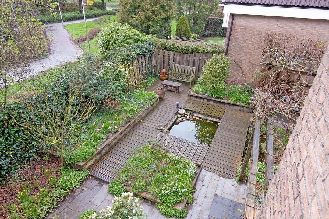 Spacious semi-detached bungalow with garage and sunny west-facing garden — 58