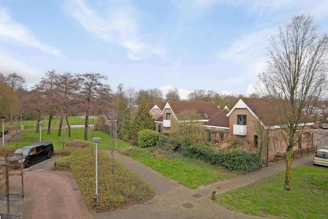 Spacious semi-detached bungalow with garage and sunny west-facing garden — 62