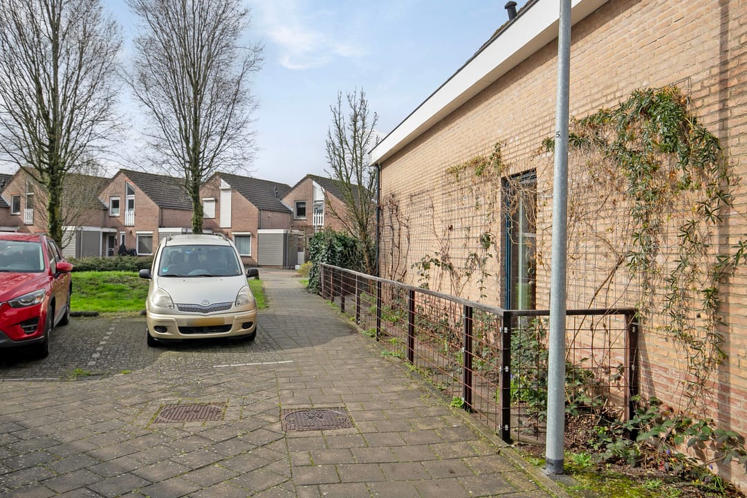 Spacious semi-detached bungalow with garage and sunny west-facing garden — 63