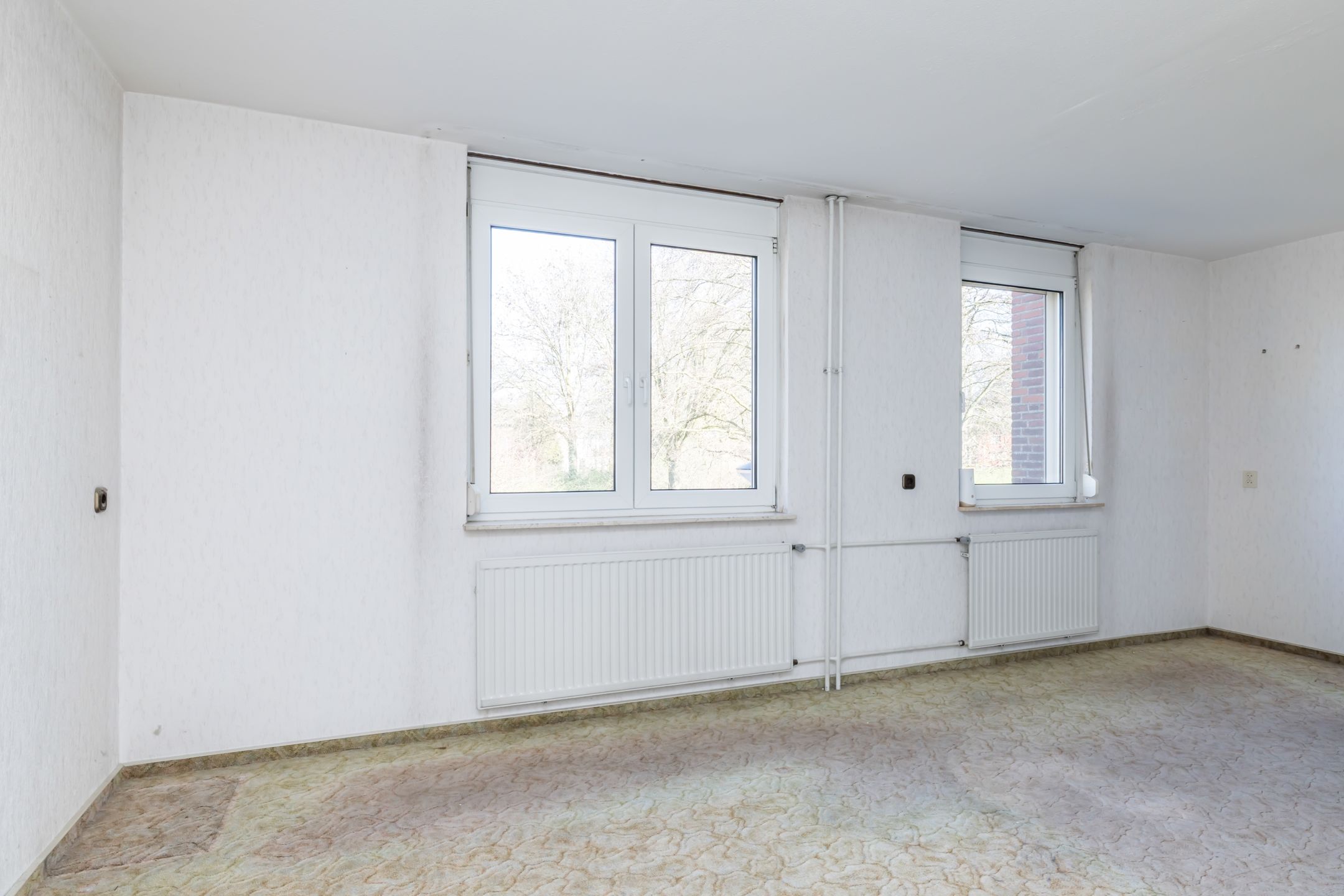 Renovation opportunity: Corner house with garage in quiet Kerkrade neighborhood — 18