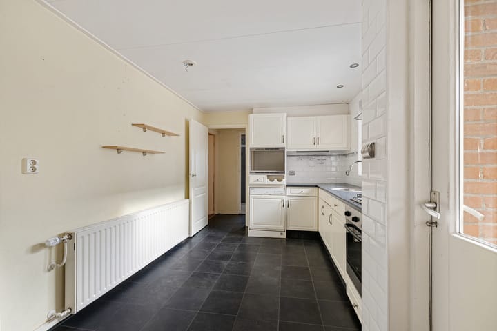 Tussenwoning te koop: Molenweg 35, Nieuwehorne