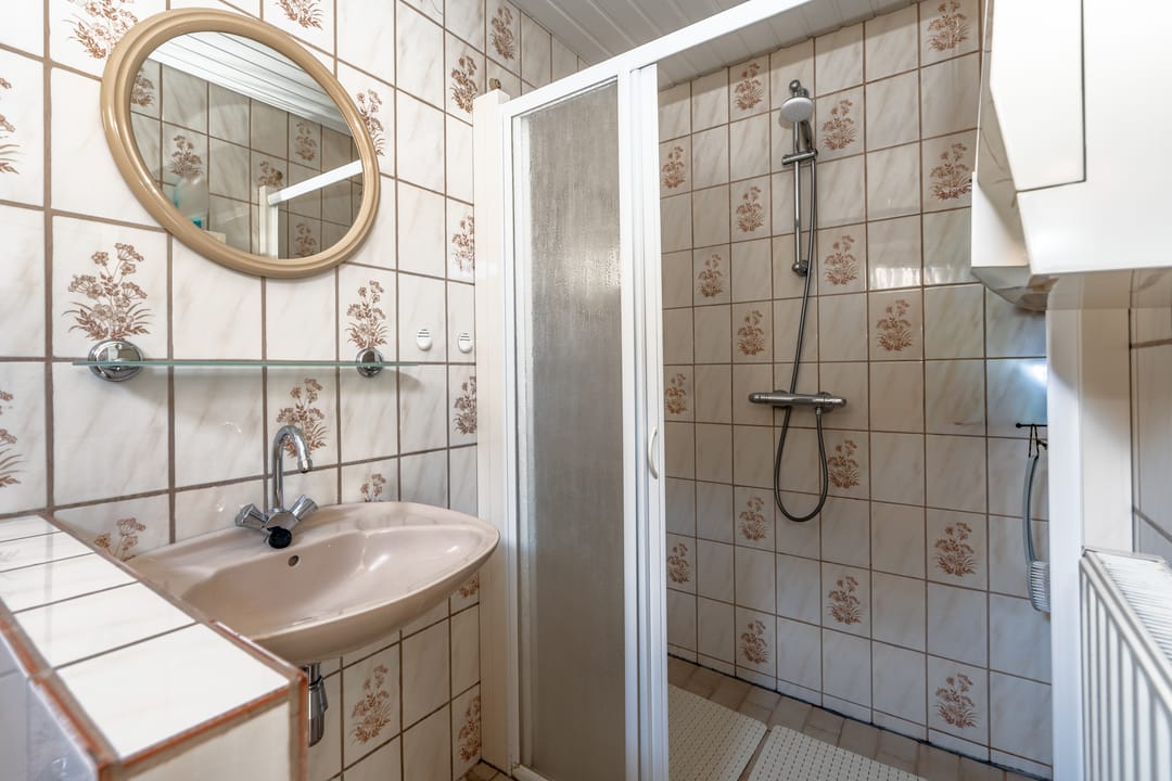 Spacious detached home with garage and south-facing garden in Muntendam center — 24