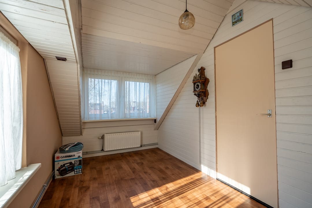 Spacious detached home with garage and south-facing garden in Muntendam center — 27