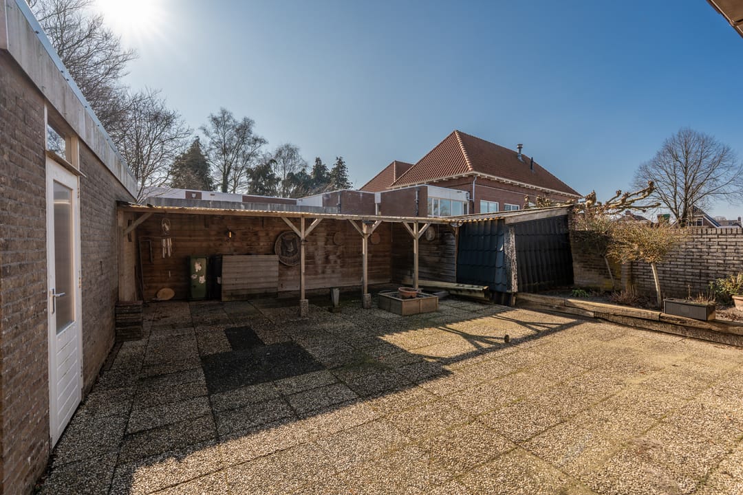 Spacious detached home with garage and south-facing garden in Muntendam center — 33