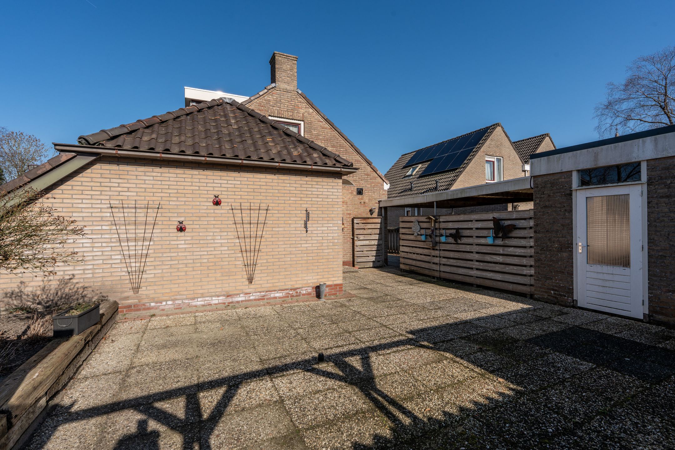 Spacious detached home with garage and south-facing garden in Muntendam center — 35