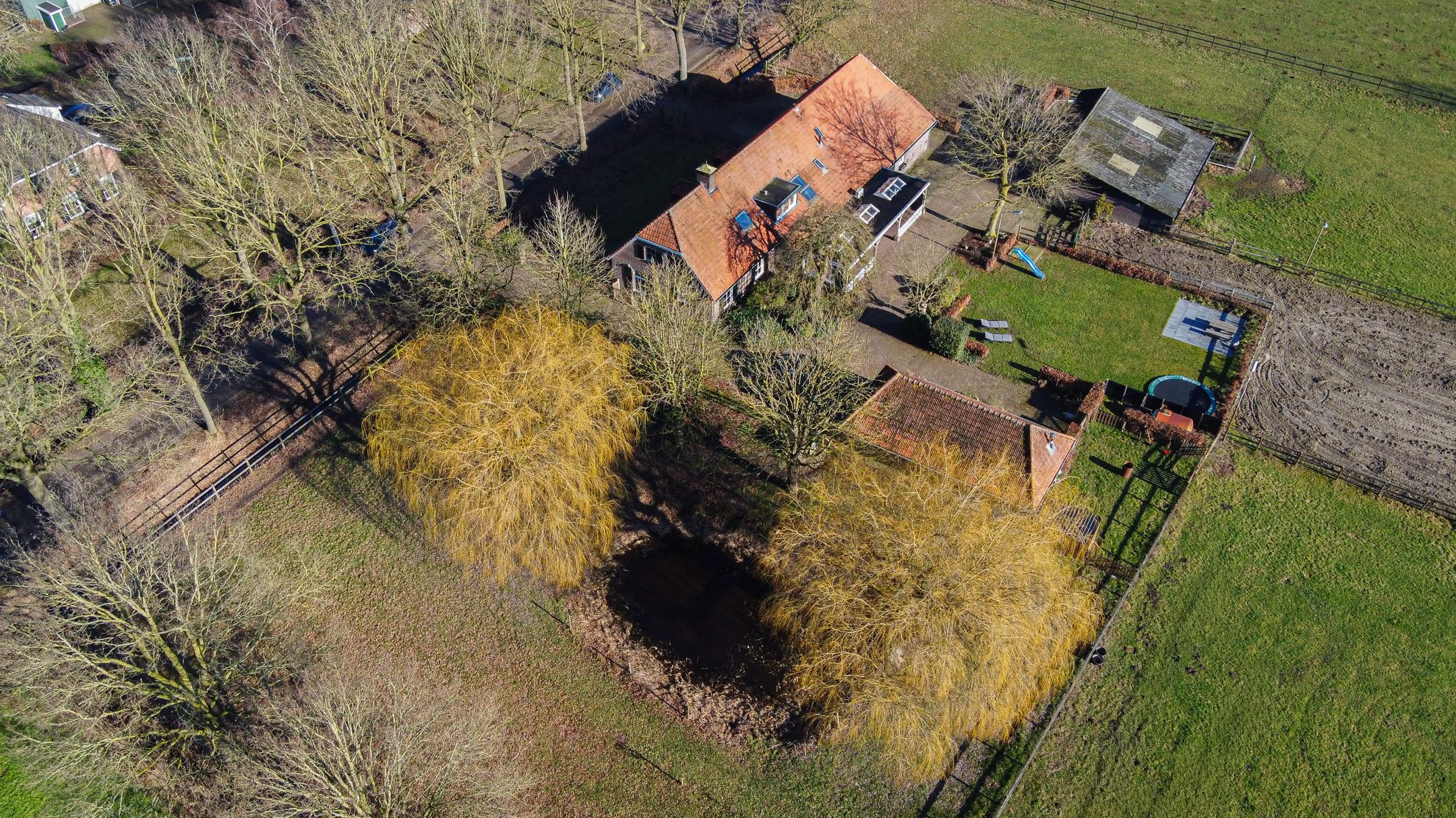 Unique farmhouse with character, comfort, and extensive grounds in a rural setting — 102