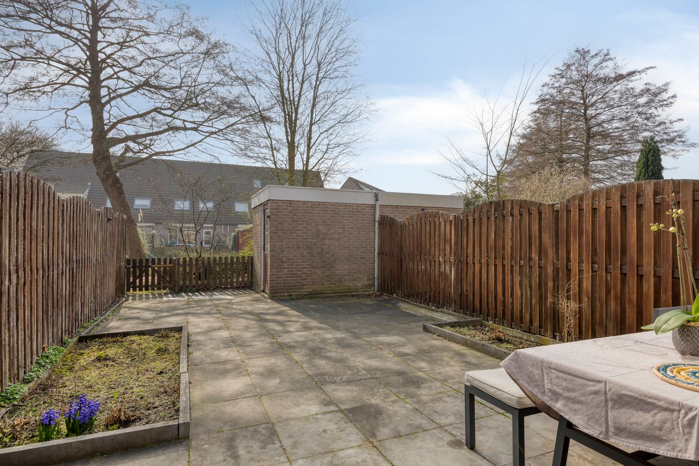 Well-maintained 5-room family home with 4 bedrooms and south-facing garden in Schollevaar neighborhood — 14