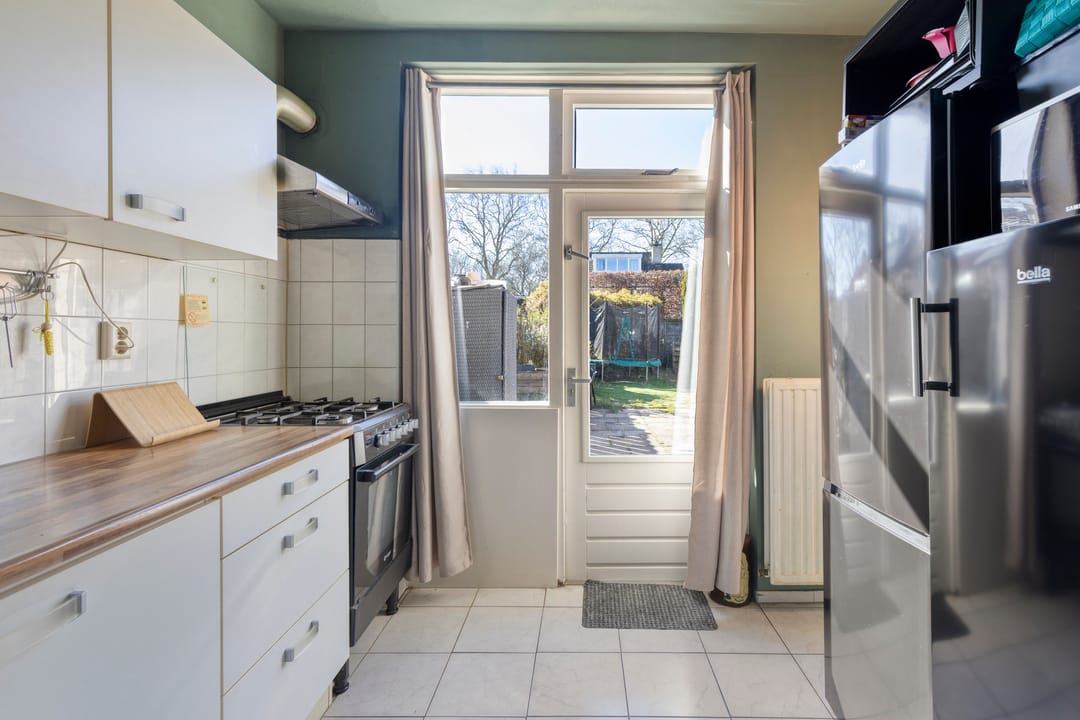 Practical family home with sunny backyard in quiet Dongen location — 22