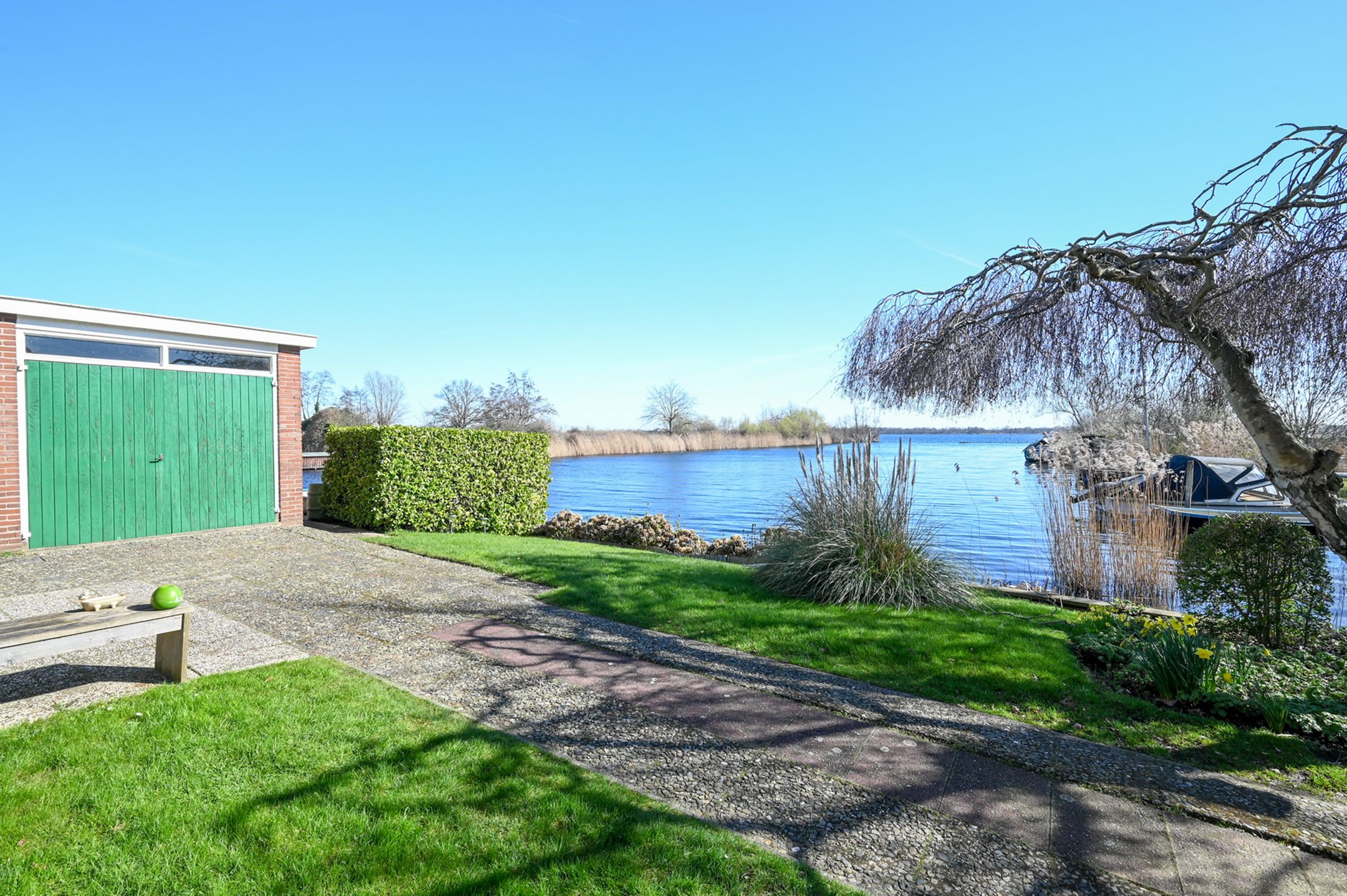 Waterfront family home with private jetty and double garage in Nederhorst den Berg — 33