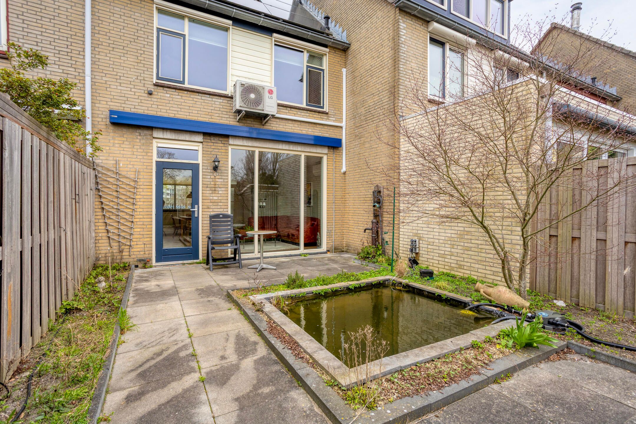 Idyllic terraced house in Amsterdam-Noord with bought-off ground lease — 30