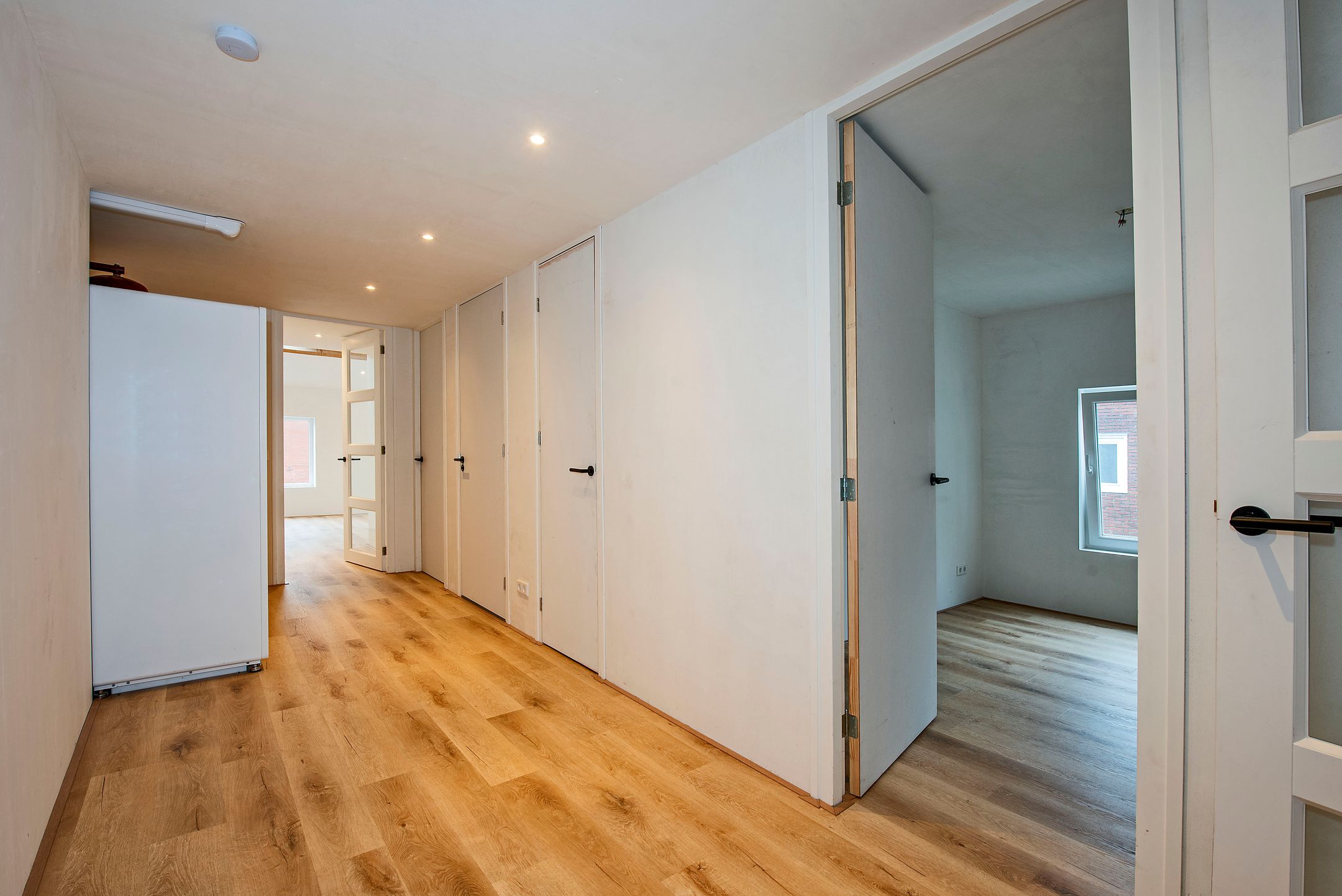 Renovated Top Floor Apartment with Heat Pump and Parking in Borne — 9