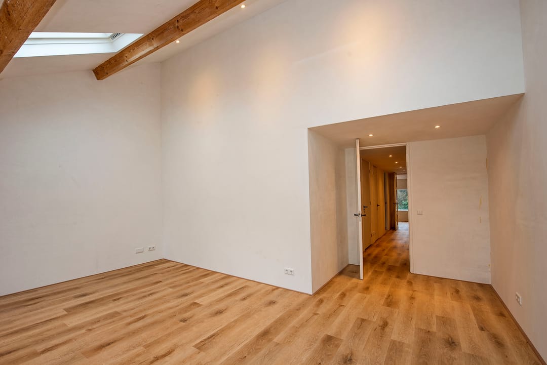 Renovated Top Floor Apartment with Heat Pump and Parking in Borne — 16
