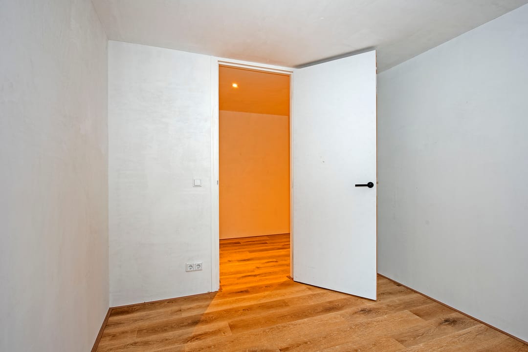 Renovated Top Floor Apartment with Heat Pump and Parking in Borne — 11