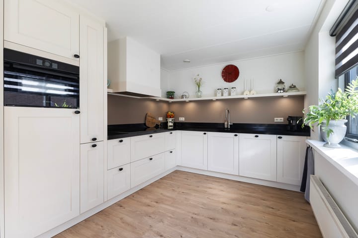 Foto 2 van Koweblomke 53