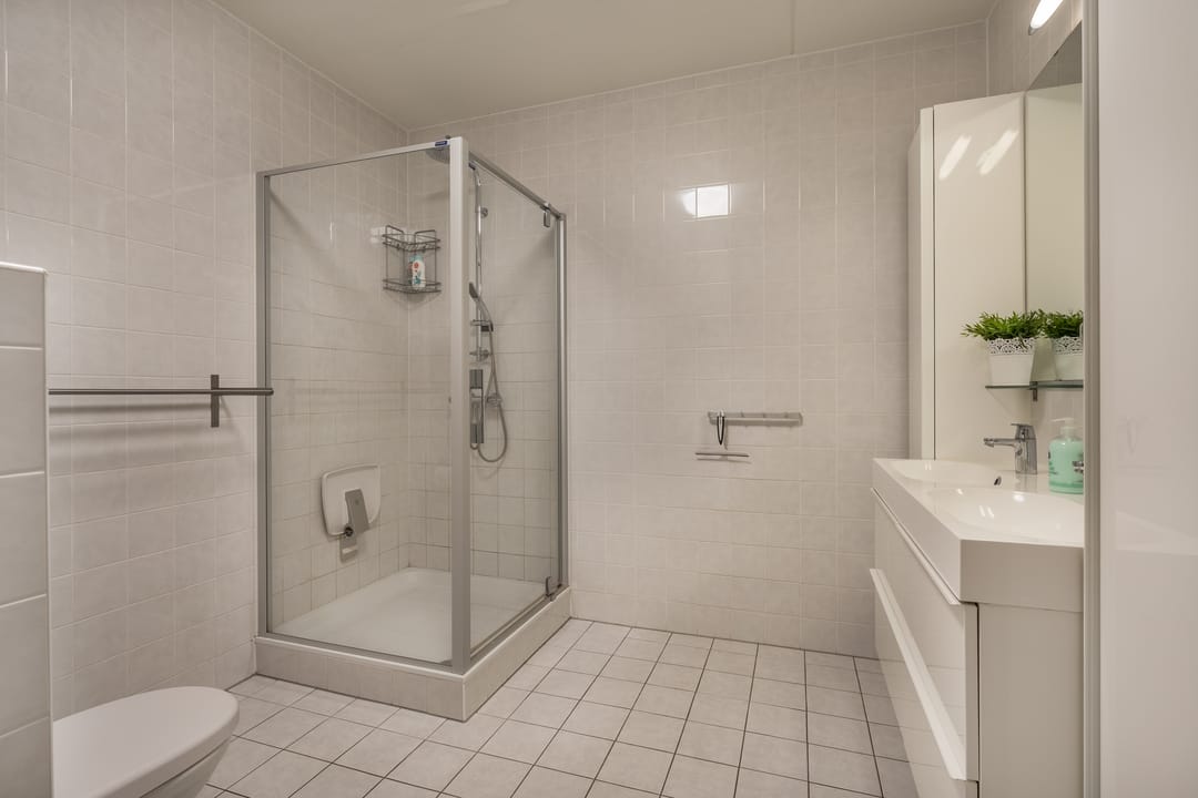 Modern ground-floor apartment with private parking in Hedel center — 13